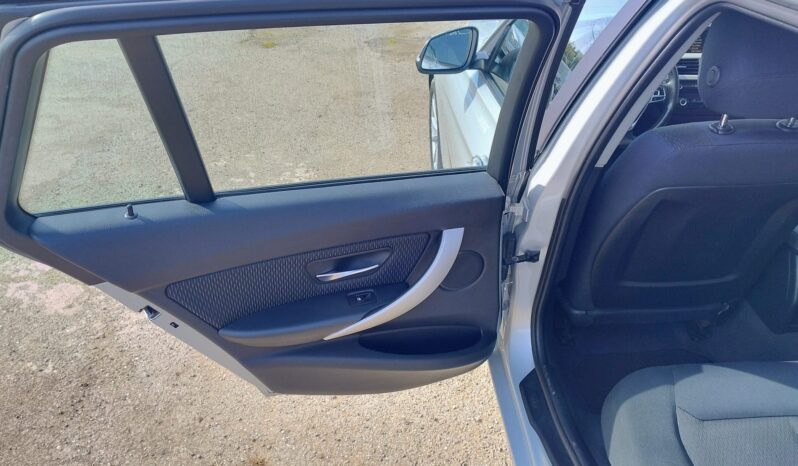 Bmw 318d Touring pieno